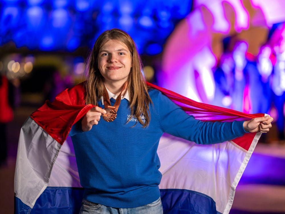 Image of me with the dutch flag at EuroSkills 2025 in Herning, Denmark